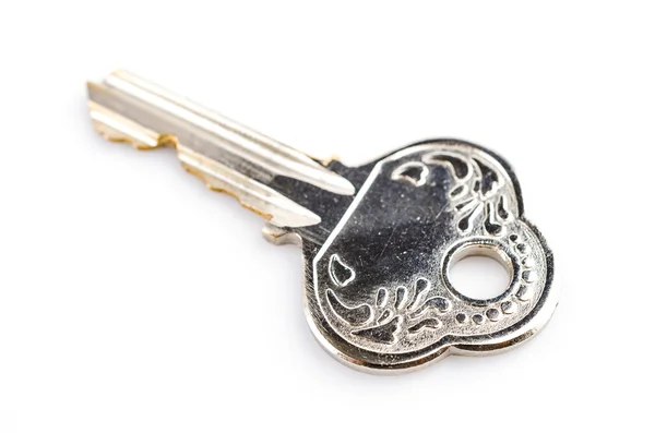 Key on white — Stock Photo, Image