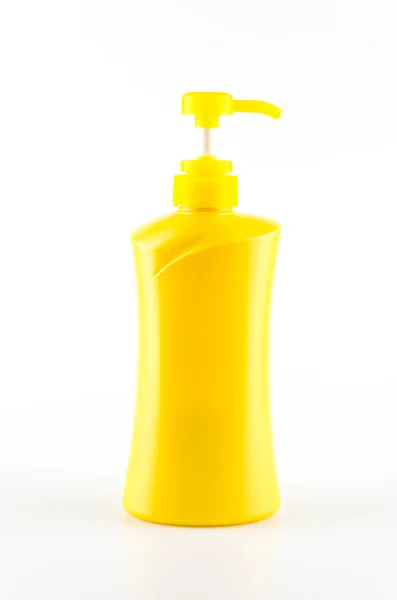 Žlutá láhev čerpadlo — Stock fotografie