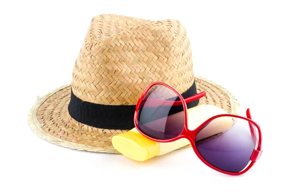 Chapeau, lunettes de soleil, lotion corporelle — Photo