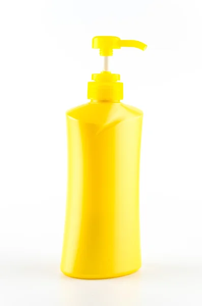 Желтый бутылочный насос — стоковое фото