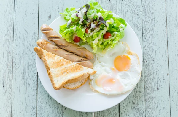 Breakfast in white plate — Stock Photo, Image