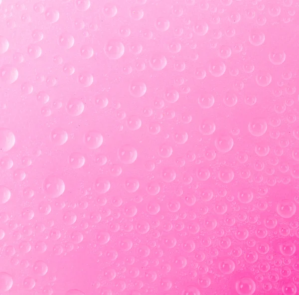Kapky vody na barvu pozadí — Stock fotografie