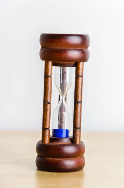 Hourglass on the table — Stock Photo, Image