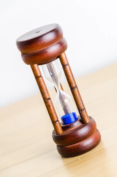 Hourglass on the table — Stock Photo, Image