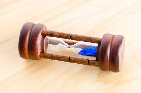 Hourglass on the table — Stock Photo, Image