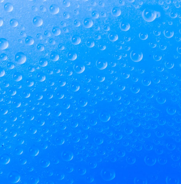 Kapky vody na barvu pozadí — Stock fotografie