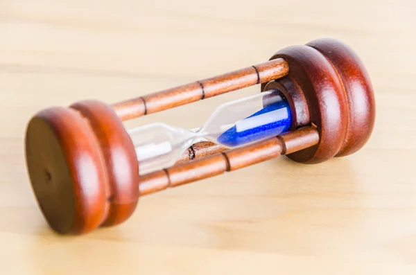 Hourglass on the table — Stock Photo, Image