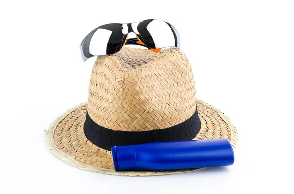 Hatt, solglasögon och body lotion — Stockfoto
