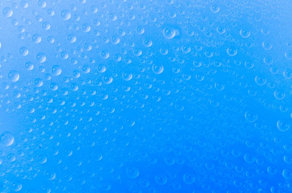 Gotas de agua sobre fondo de color —  Fotos de Stock