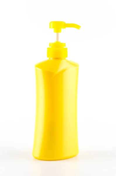 Žlutá láhev čerpadlo — Stock fotografie