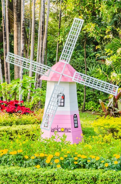 Windmill in the garden — Stock Photo, Image