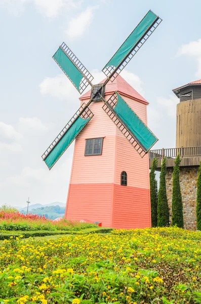 Windmill in the garden — Stock Photo, Image