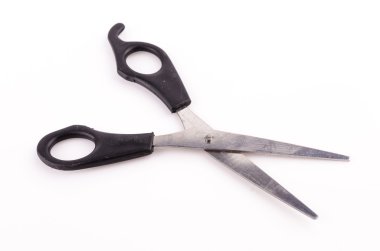 Scissors on white