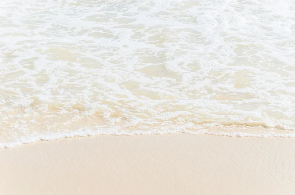 Deniz dalgası ve kum — Stok fotoğraf