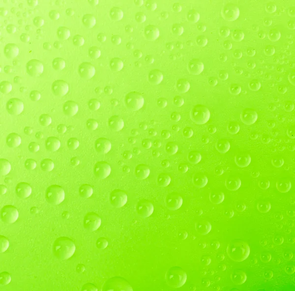 Gotas de agua sobre fondo de color —  Fotos de Stock