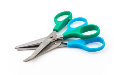 Scissors on white