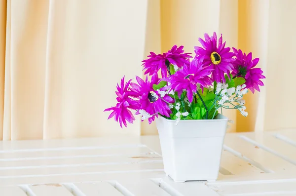 Fake flowers in vase — Stock Photo, Image