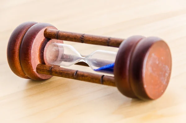 Hourglass on the table — Stock Photo, Image