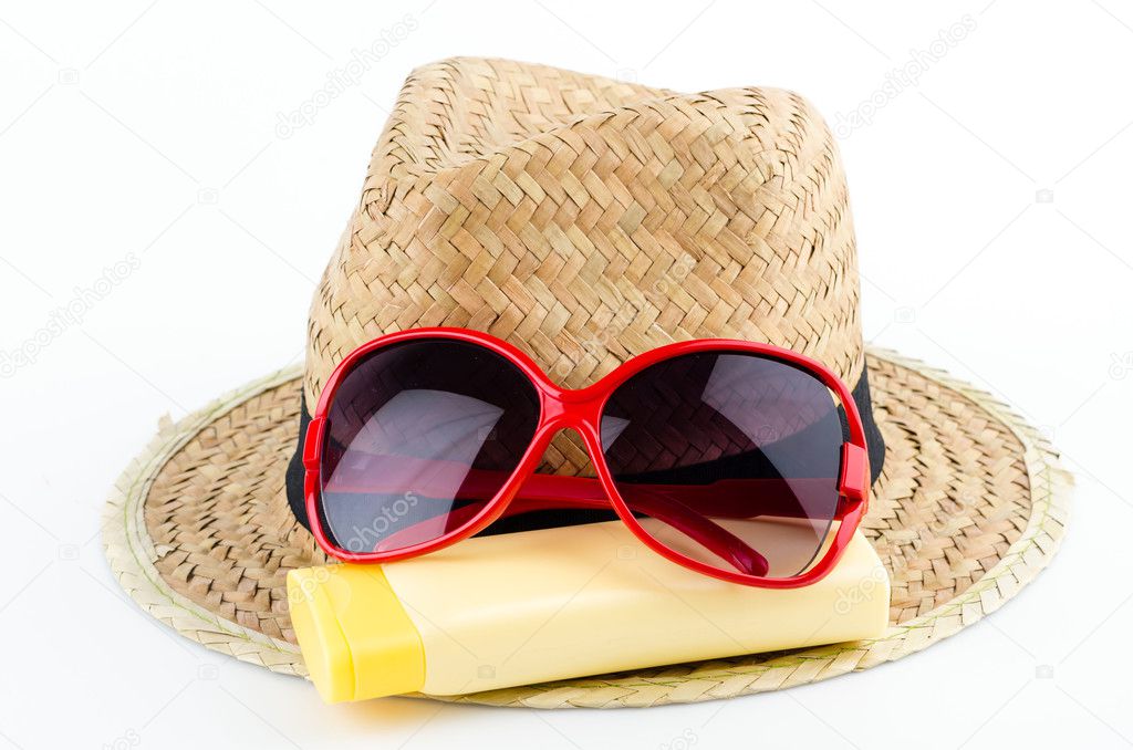 Hat , sunglasses and body lotion