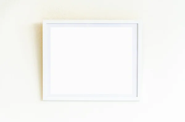 White frame on white wall — Stock Photo, Image