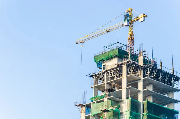 Obra de construcción de grúas —  Fotos de Stock