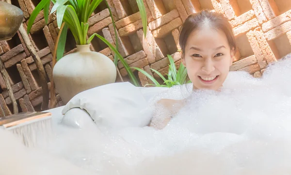 Woman spa bath in jacuzzi — Stock Photo, Image