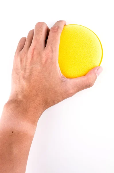 Hand houden spons geïsoleerd op witte achtergrond — Stockfoto