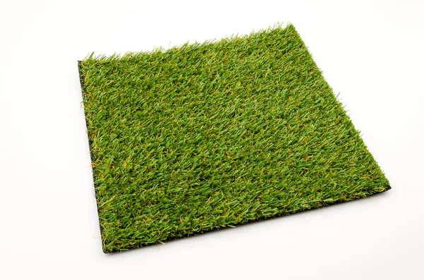 Tapete de grama isolado fundo branco — Fotografia de Stock