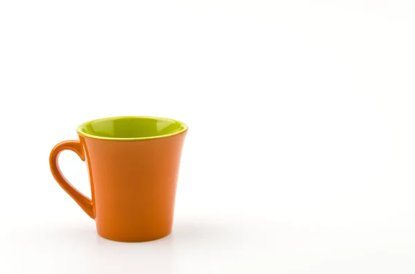 Tasse orange isolée — Photo