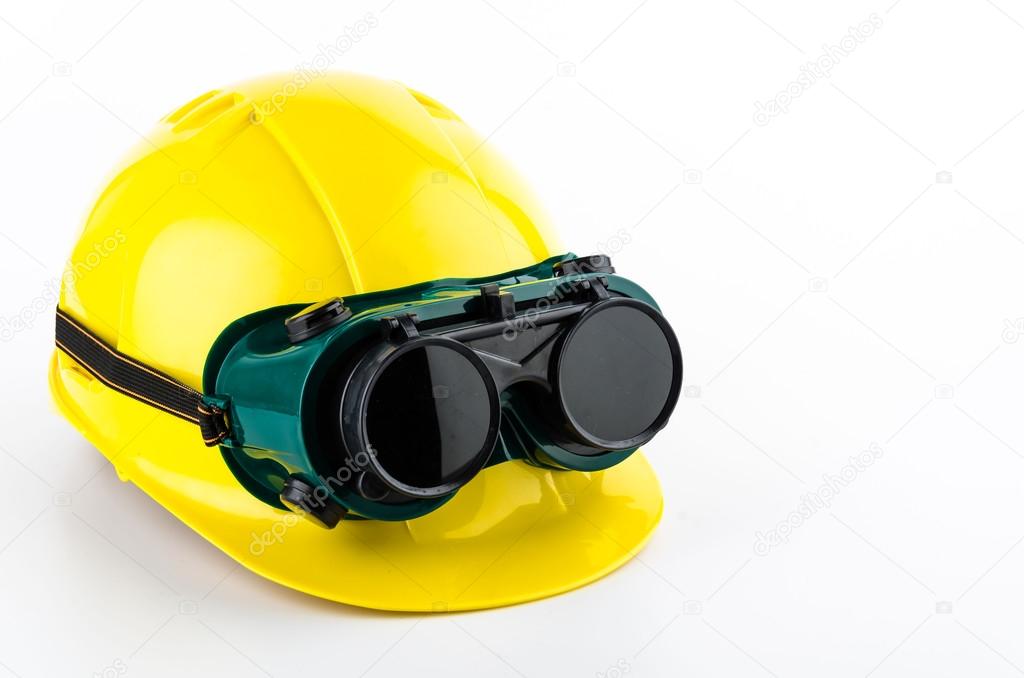 Safety helmet and goggles glasses isolated on white background