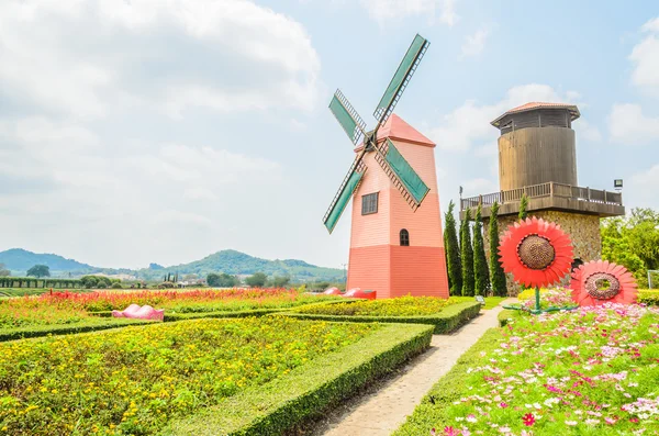 Windmill in the garden — Stock Photo, Image