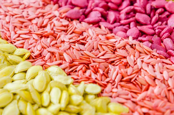 Textura de sementes coloridas usando como fundo — Fotografia de Stock