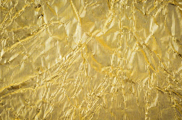 Papel dourado textura amassada — Fotografia de Stock