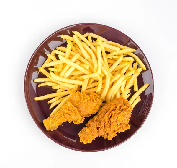 Pommes frites och stekt kyckling — Stockfoto