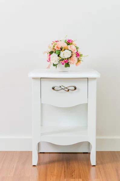 Flower on bedside table Royalty Free Stock Photos