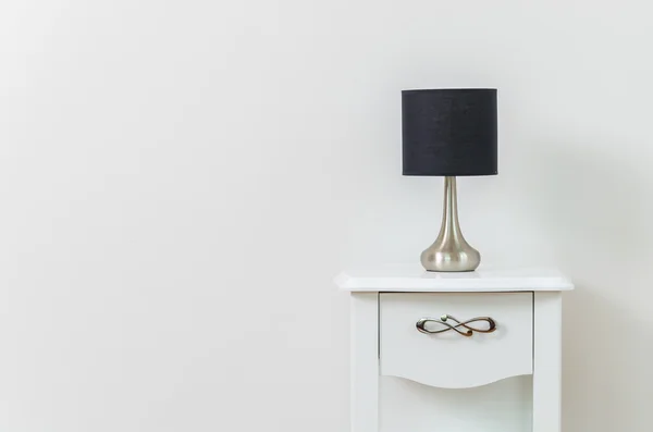 Lamp on bedside table — Stock Photo, Image