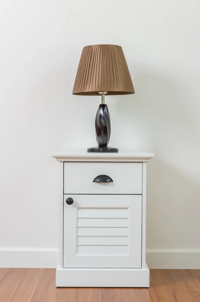 Lamp on bedside table — Stock Photo, Image