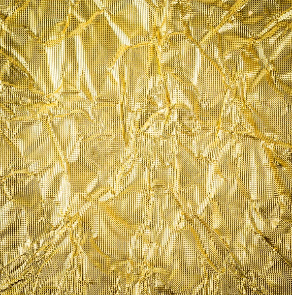 Papel dourado crumpled textura fundo — Fotografia de Stock