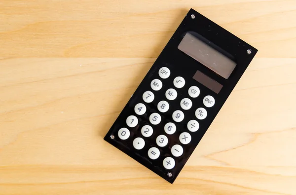 Calculator op tabel — Stockfoto