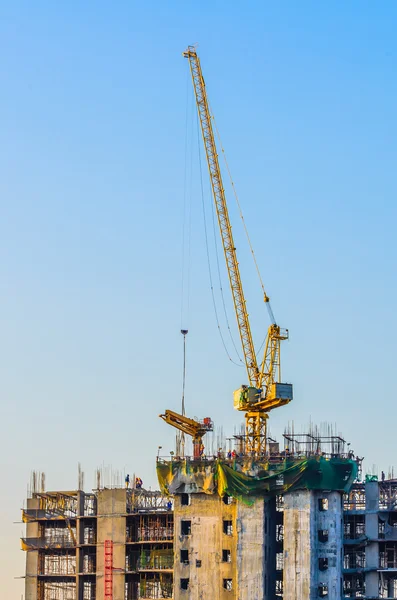 Construcción de grúas Crepúsculo veces — Foto de Stock