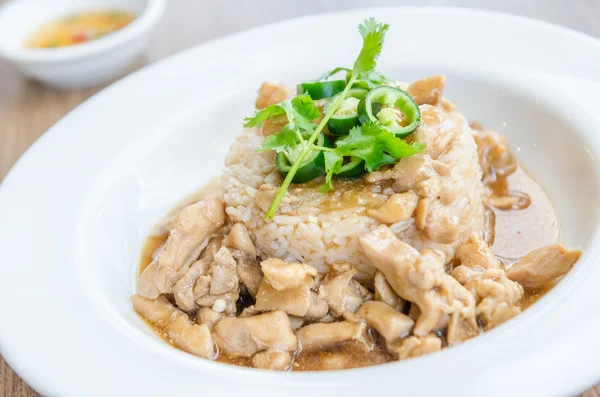 Chicken with brown sauce on rice — Stock Photo, Image