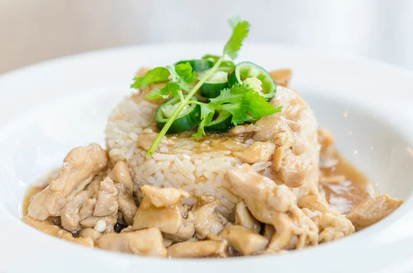 Chicken with brown sauce on rice — Stock Photo, Image