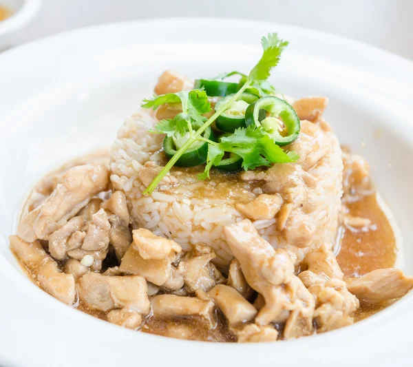 Chicken with brown sauce on rice — Stock Photo, Image