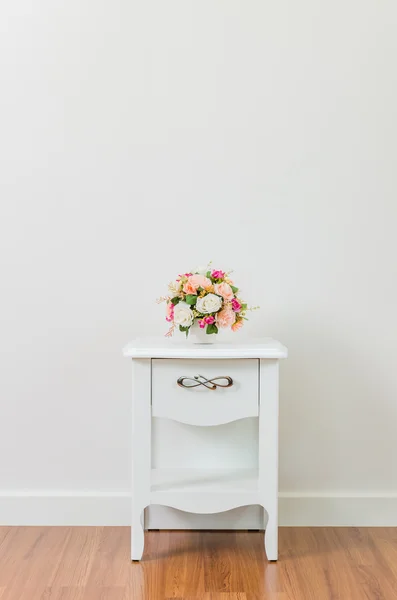 Flower on bedside table Stock Picture