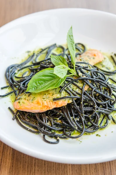 Salmon black pasta — Stock Photo, Image