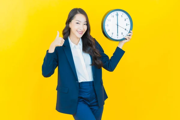 Portrait Beautiful Young Asian Woman Show Alarm Clock Yellow Color — Stock Photo, Image