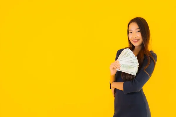 Portrait Beautiful Young Asian Woman Money Cash Yellow Isolated Background — Stock Photo, Image