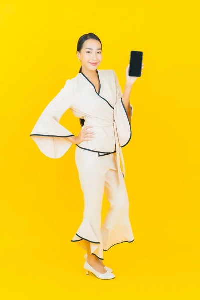 Portrait Beautiful Young Business Asian Woman Smart Mobile Phone Yellow — Stock Photo, Image