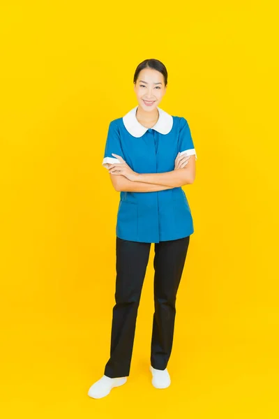 Portrait Beautiful Young Asian Woman Maid Housekeeping Smile Action Yellow — Stock Photo, Image