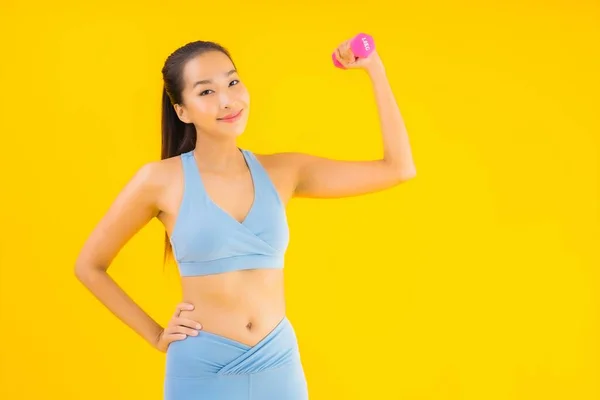 Portrait Beautiful Young Asian Woman Dumbbell Sportwear Ready Exercise Yellow — Stock Photo, Image